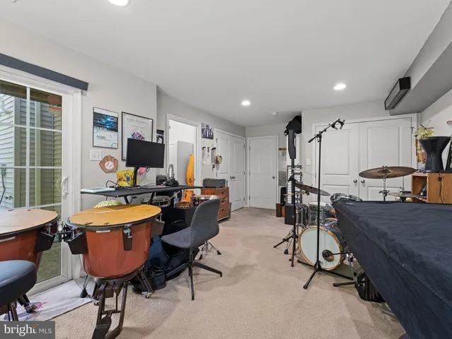a kitchen with a stove and a refrigerator