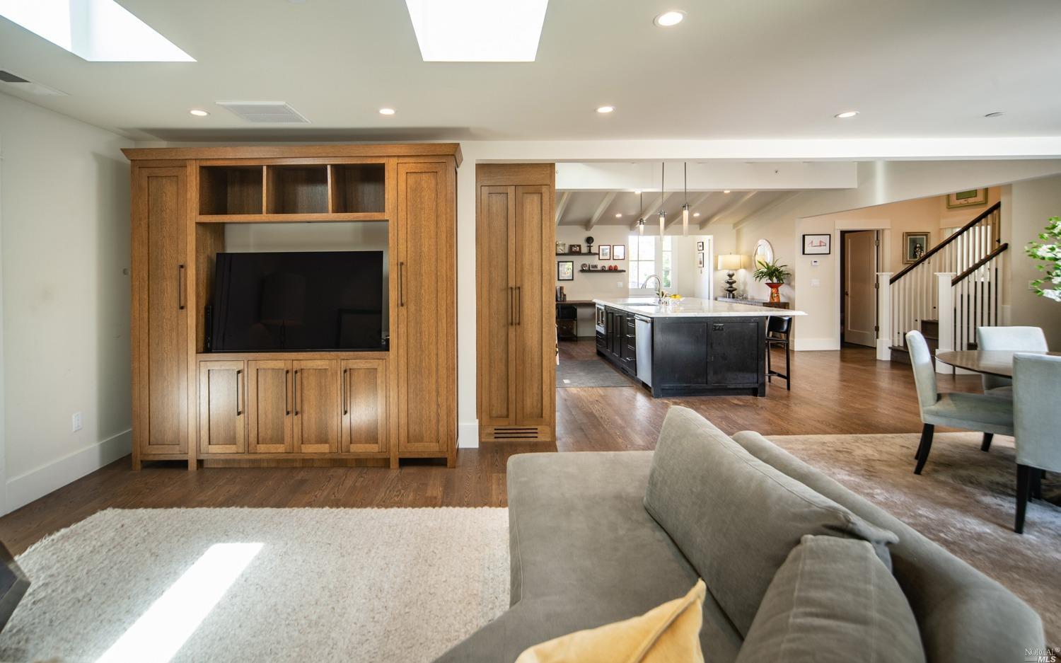 208 Reed Boulevard Mill Valley, CA 94941 - Photo 19 of 47 The family room with this built-in media center is open to the kitchen with a great room layout.