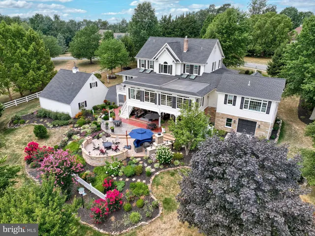 front view of a house with a swimming pool