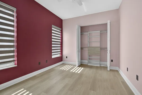 a view of a livingroom with a hall and a window