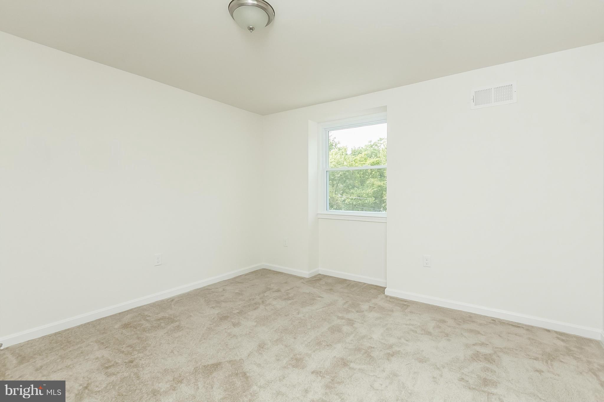 16 Bladen Road Baltimore, MD 21221 - Photo 18 of 29 an empty room with a window