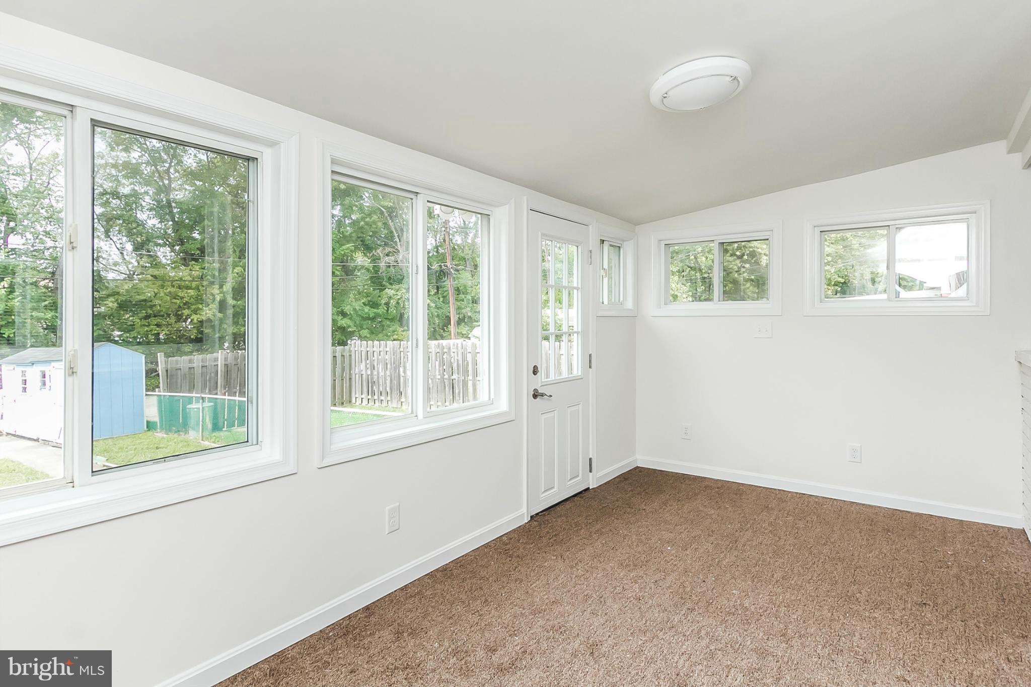 16 Bladen Road Baltimore, MD 21221 - Photo 22 of 29 an empty room with windows
