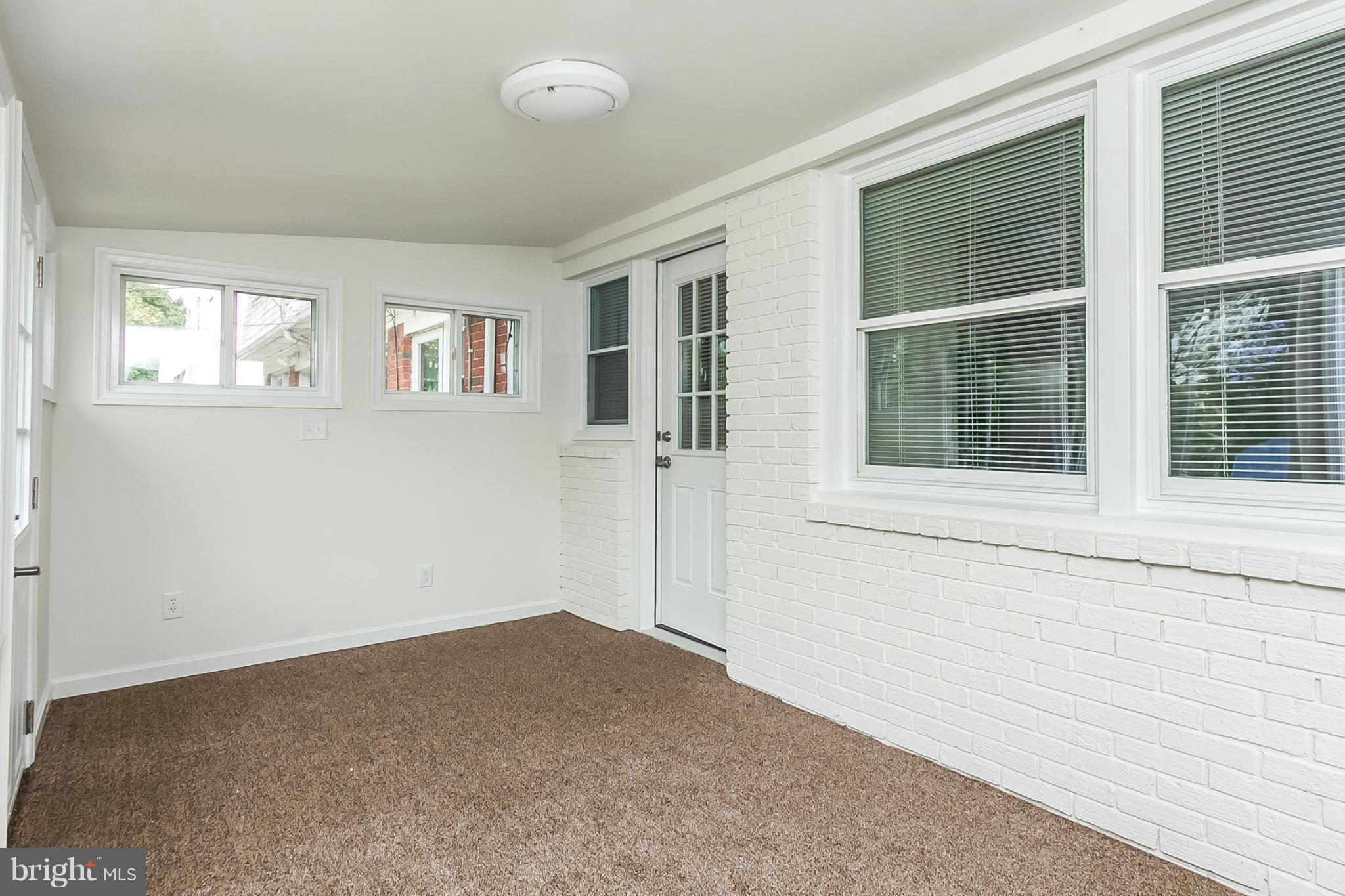 16 Bladen Road Baltimore, MD 21221 - Photo 23 of 29 a view of empty room with windows