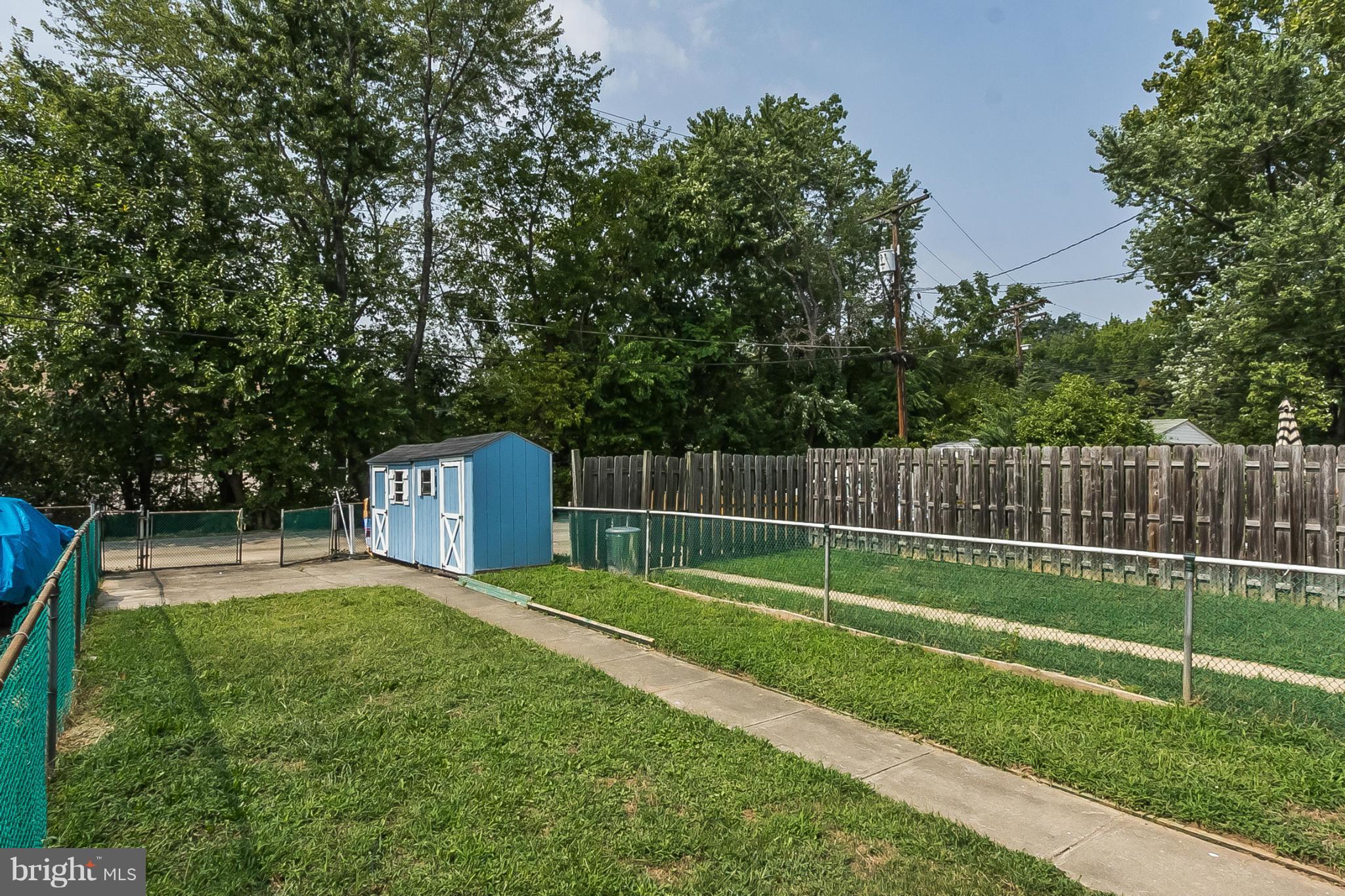 16 Bladen Road Baltimore, MD 21221 - Photo 27 of 29 a view of a backyard with a small cabin
