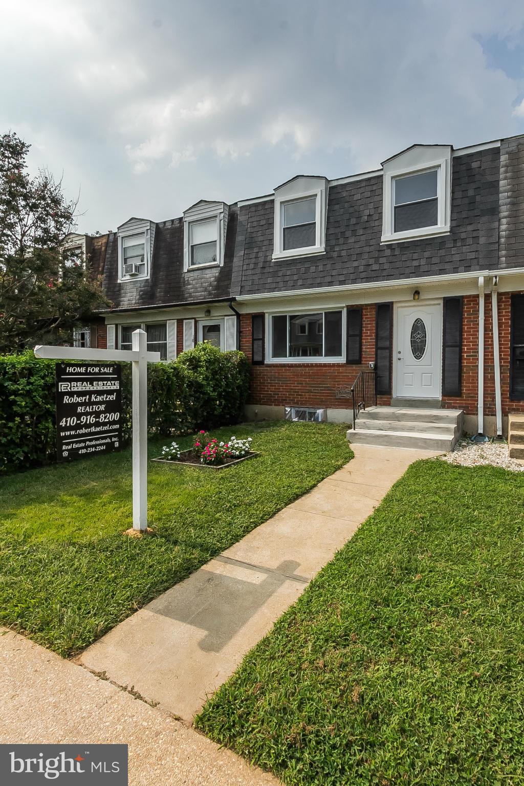 16 Bladen Road Baltimore, MD 21221 - Photo 29 of 29 a front view of a house with garden