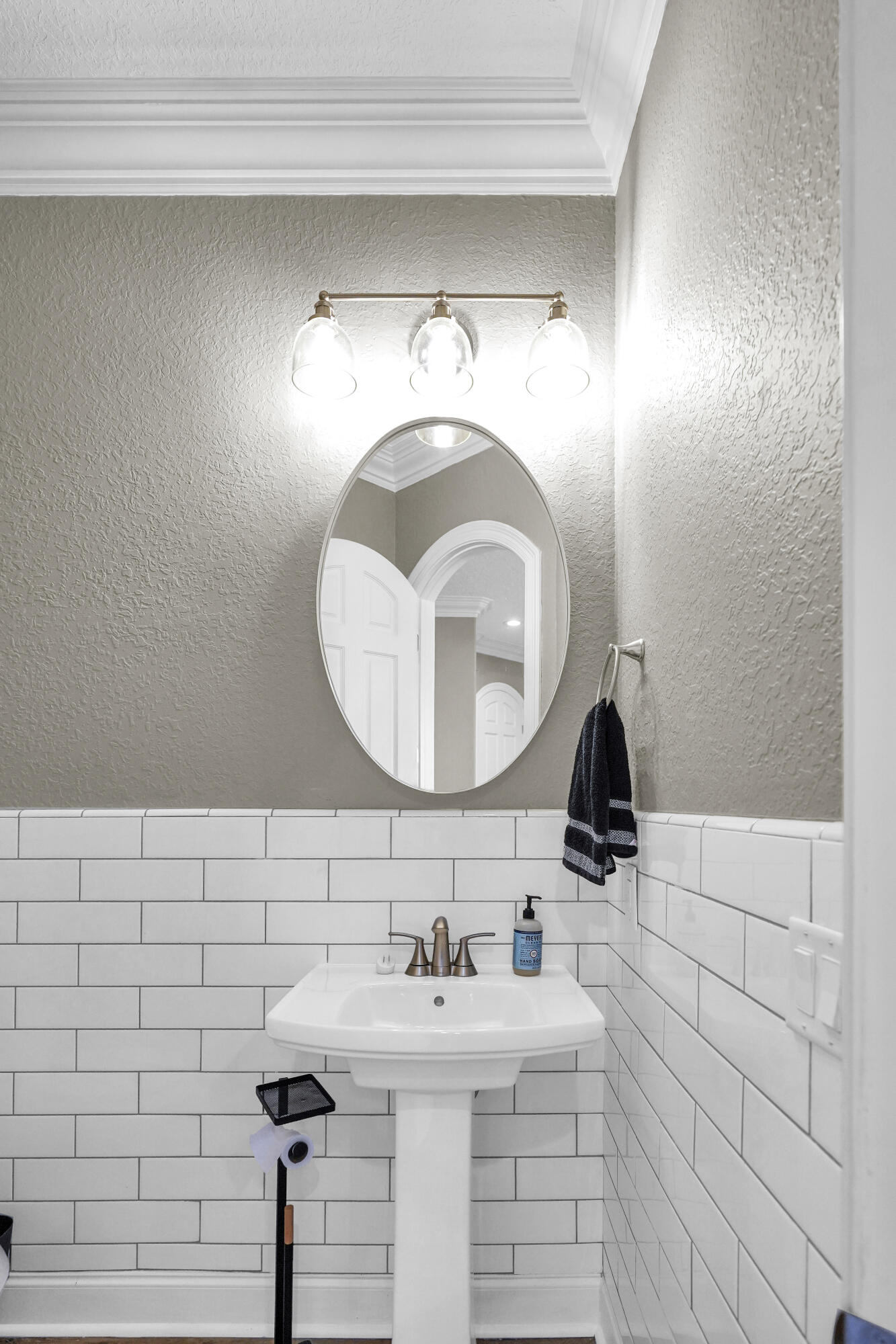 602 Harbor Boulevard, Unit 301 Destin, FL 32541 - Photo 27 of 75 a bathroom with a sink and a mirror