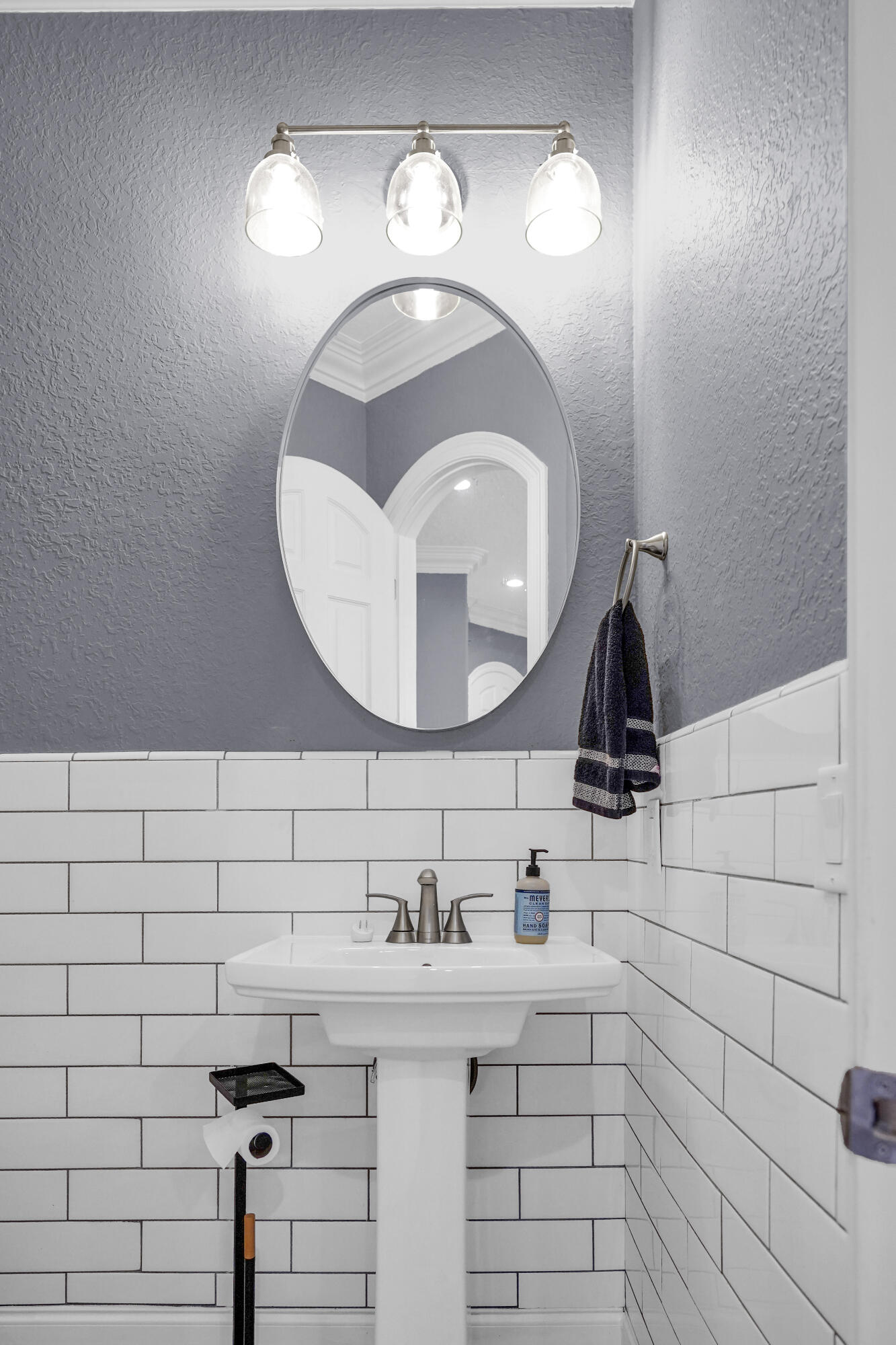 602 Harbor Boulevard, Unit 301 Destin, FL 32541 - Photo 28 of 75 a bathroom with a sink and a mirror