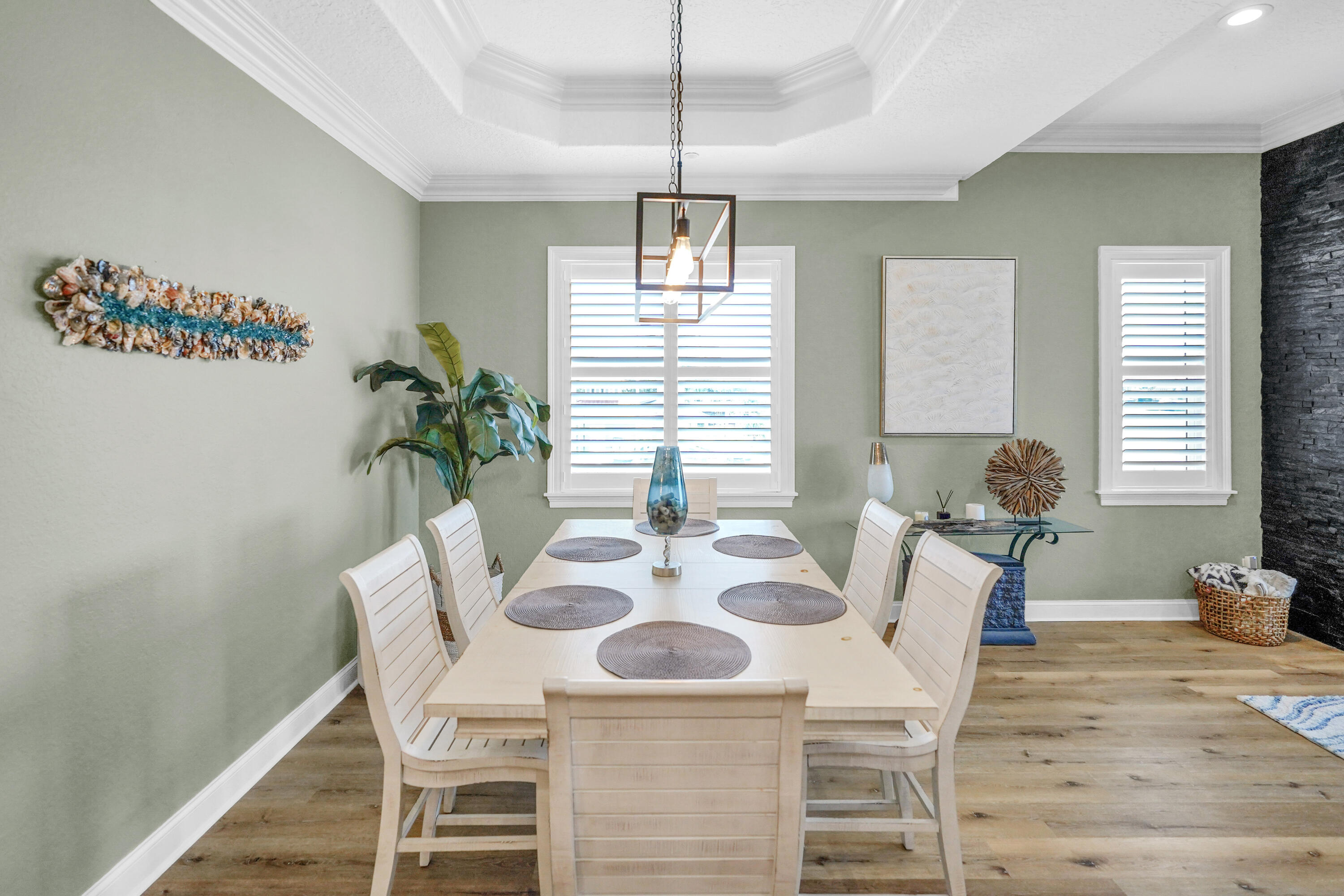 602 Harbor Boulevard, Unit 301 Destin, FL 32541 - Photo 29 of 75 a view of a dining room with furniture window and wooden floor