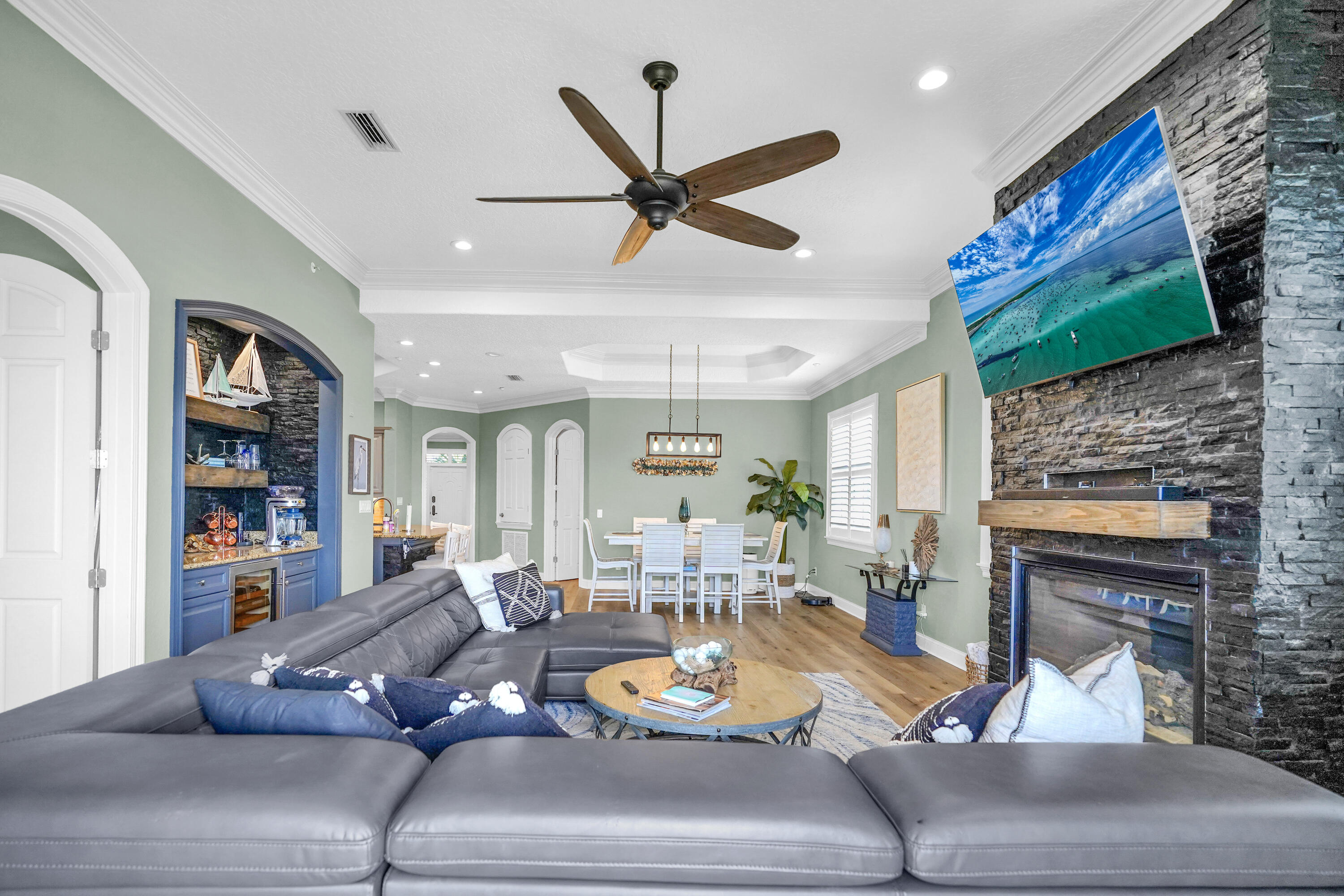 602 Harbor Boulevard, Unit 301 Destin, FL 32541 - Photo 32 of 75 a living room with furniture and a flat screen tv