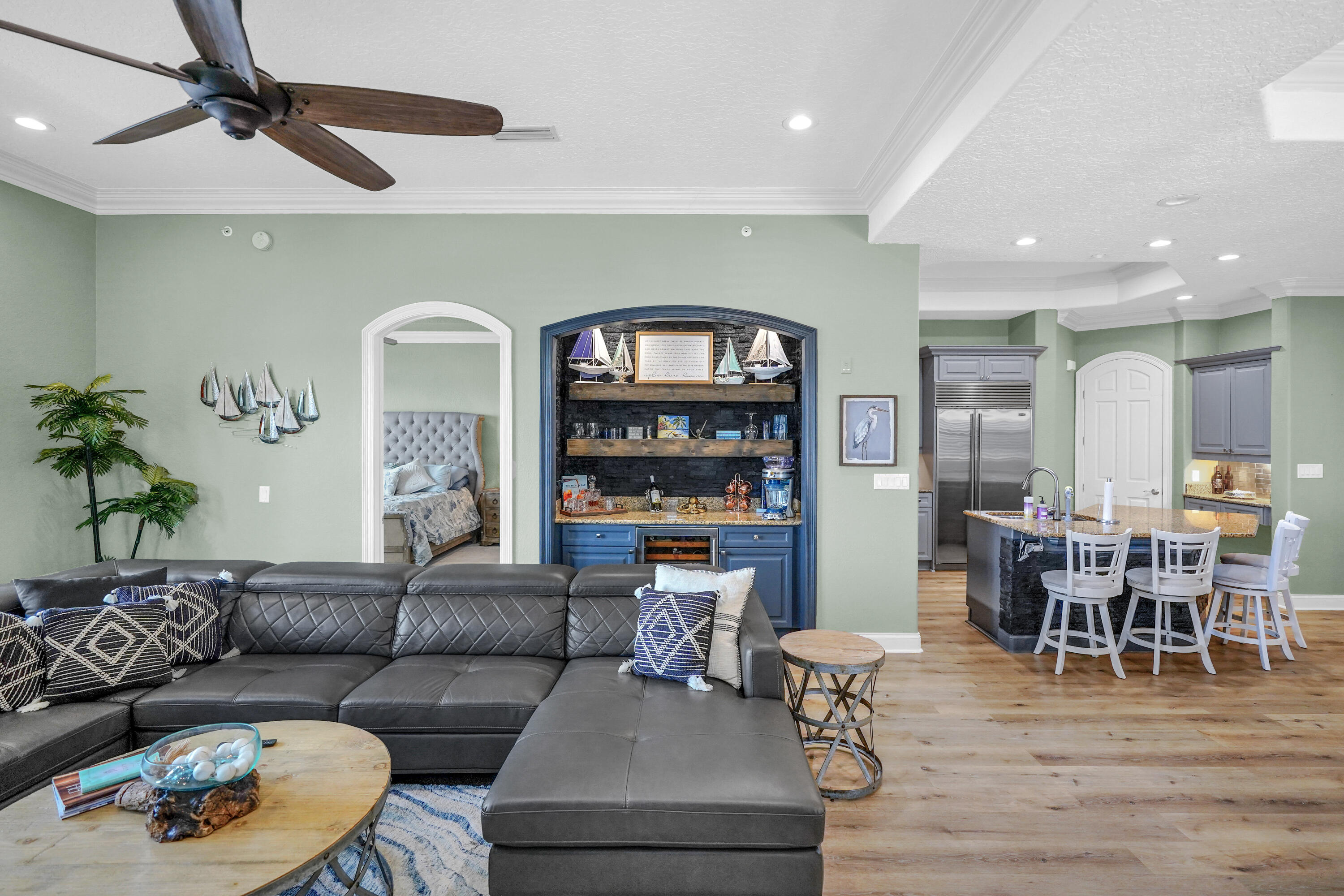 602 Harbor Boulevard, Unit 301 Destin, FL 32541 - Photo 38 of 75 a living room with furniture and a wooden floor
