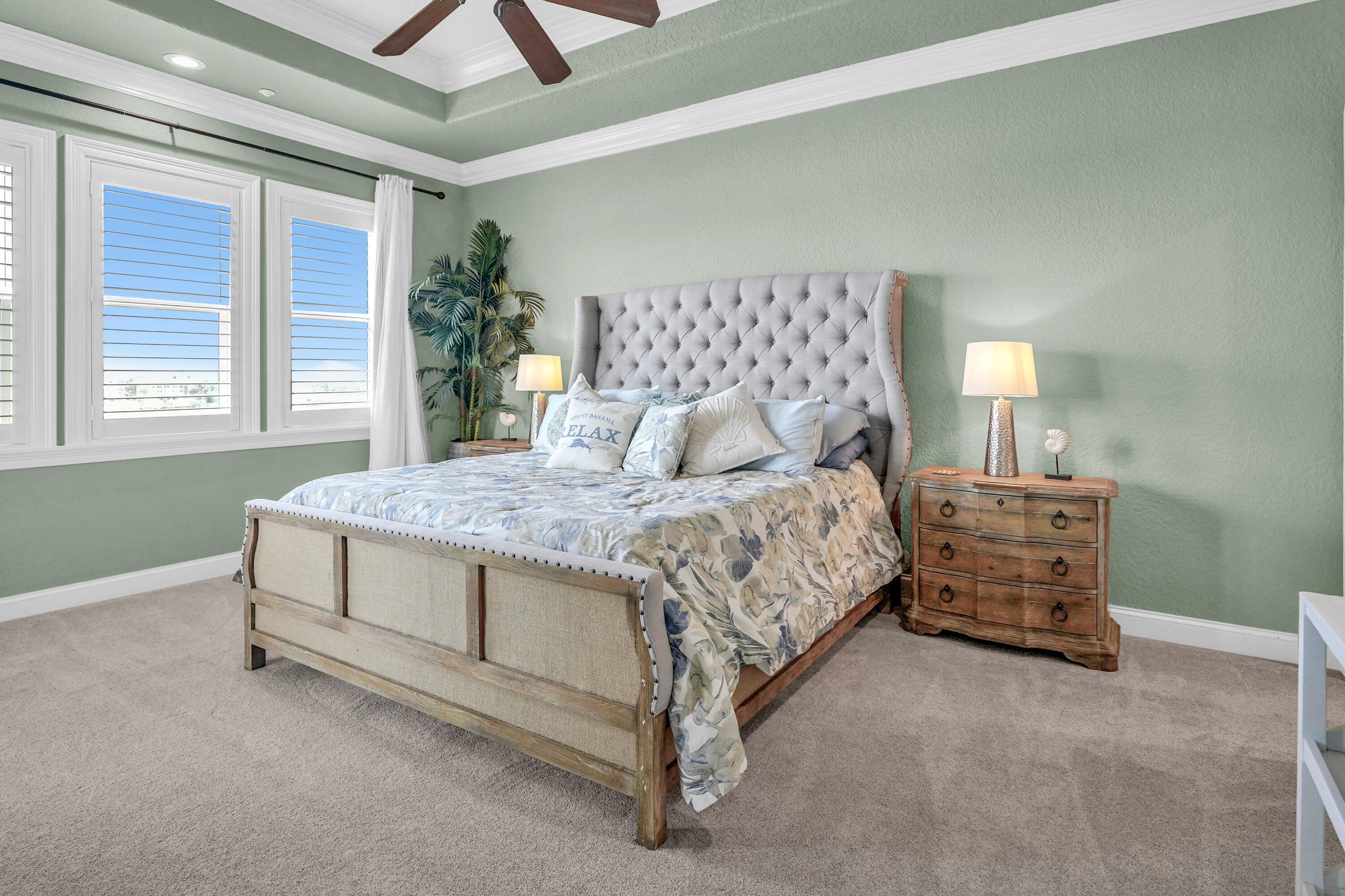 602 Harbor Boulevard, Unit 301 Destin, FL 32541 - Photo 40 of 75 a bedroom with a bed and a table
