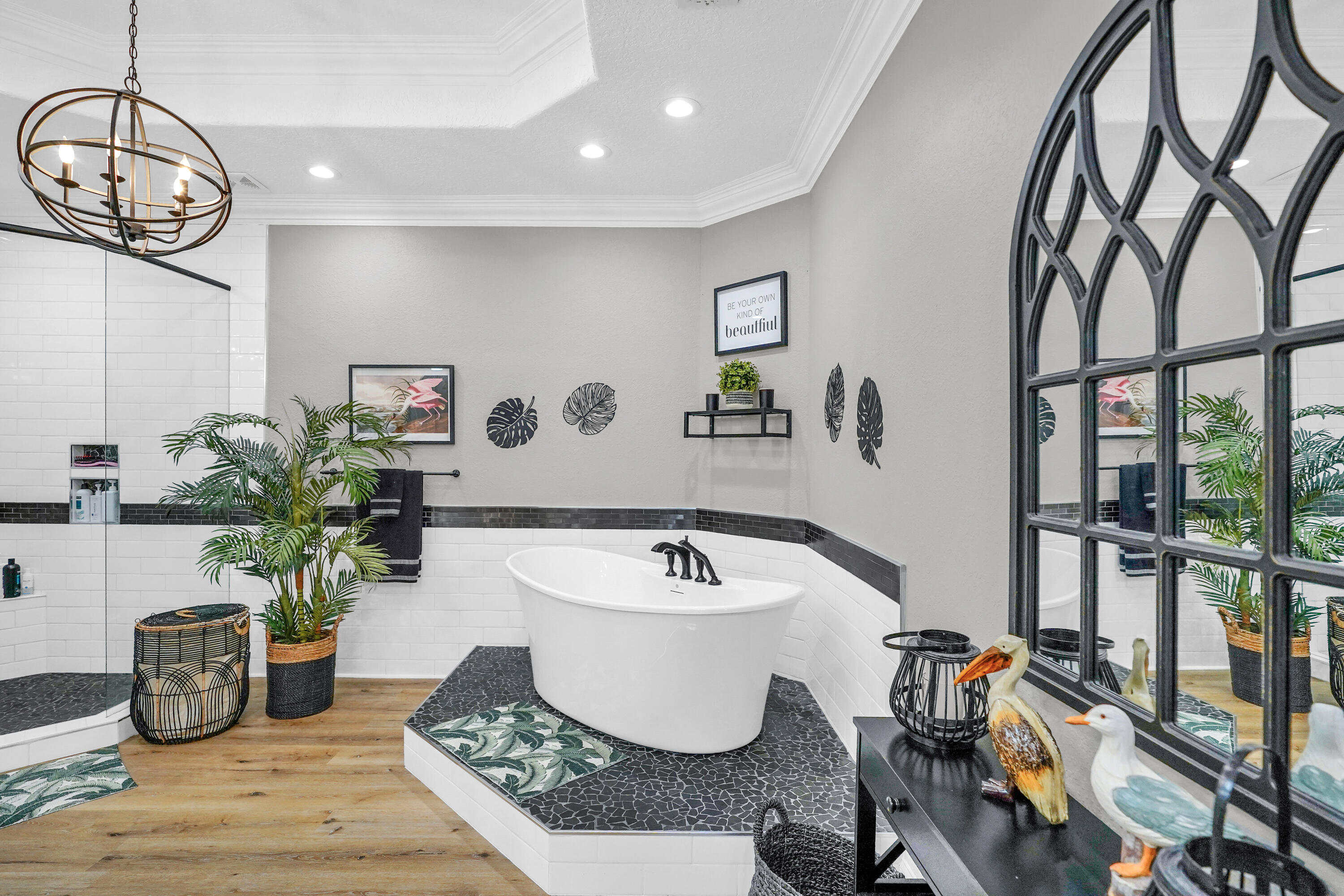 602 Harbor Boulevard, Unit 301 Destin, FL 32541 - Photo 48 of 75 a bathroom with a sink a toilet and a mirror