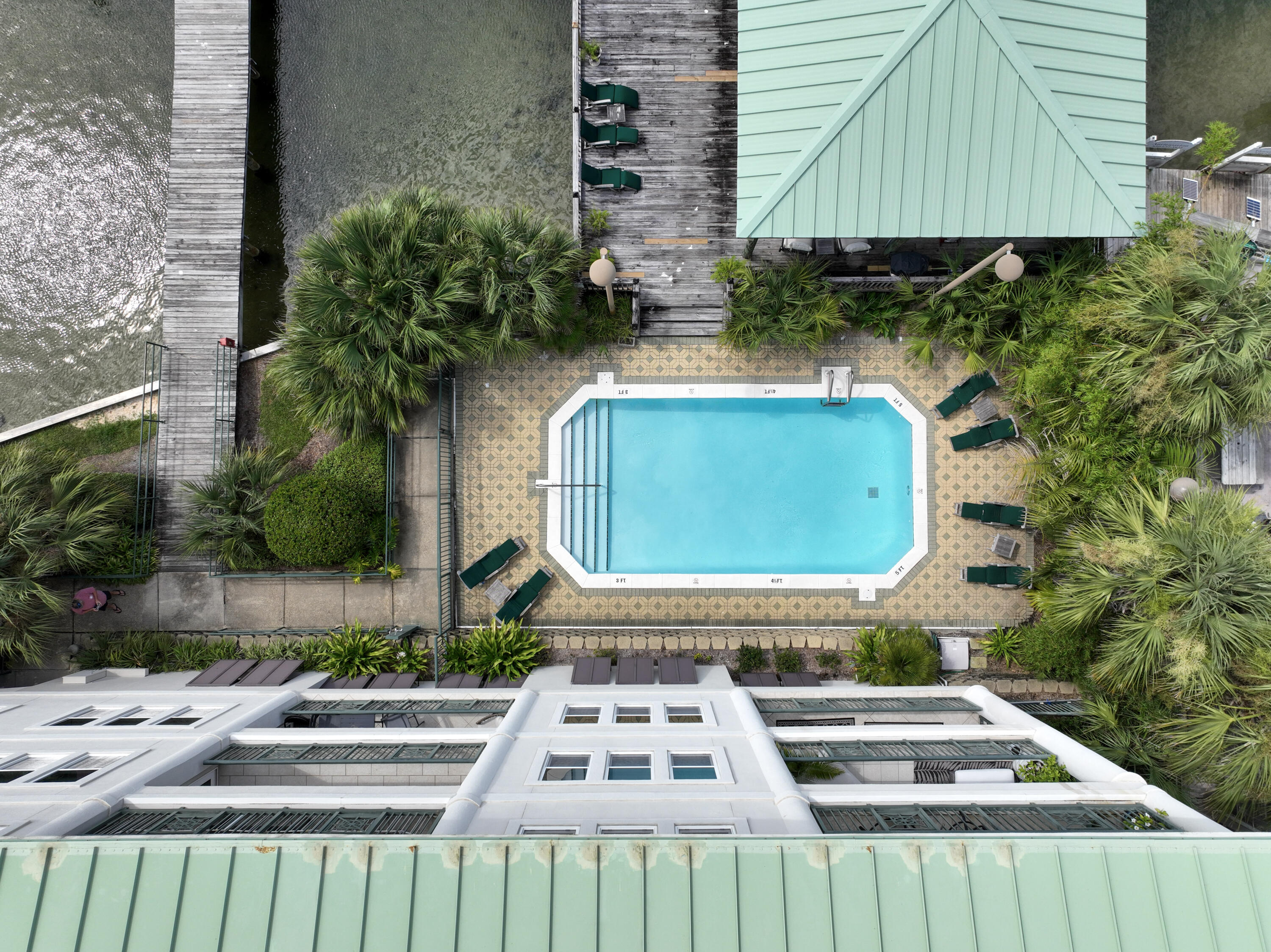 602 Harbor Boulevard, Unit 301 Destin, FL 32541 - Photo 56 of 75 a front view of a house with street