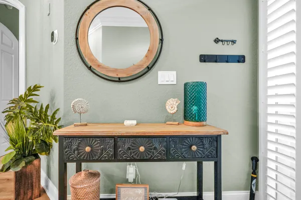a bathroom with a granite countertop bathtub shower sink and toilet