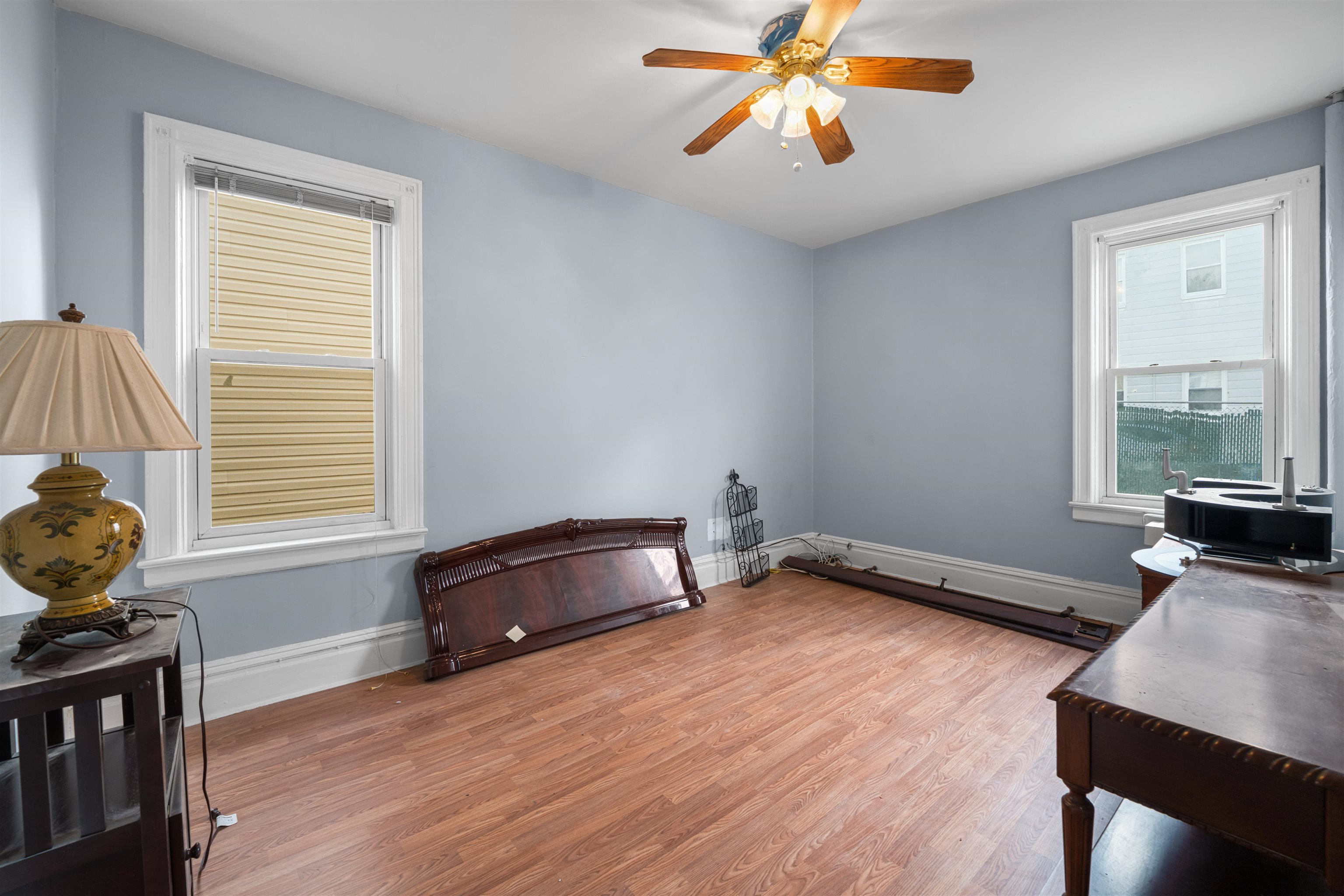 154 West 33rd Street Bayonne, NJ 07002 - Photo 25 of 40 a living room with furniture and a window