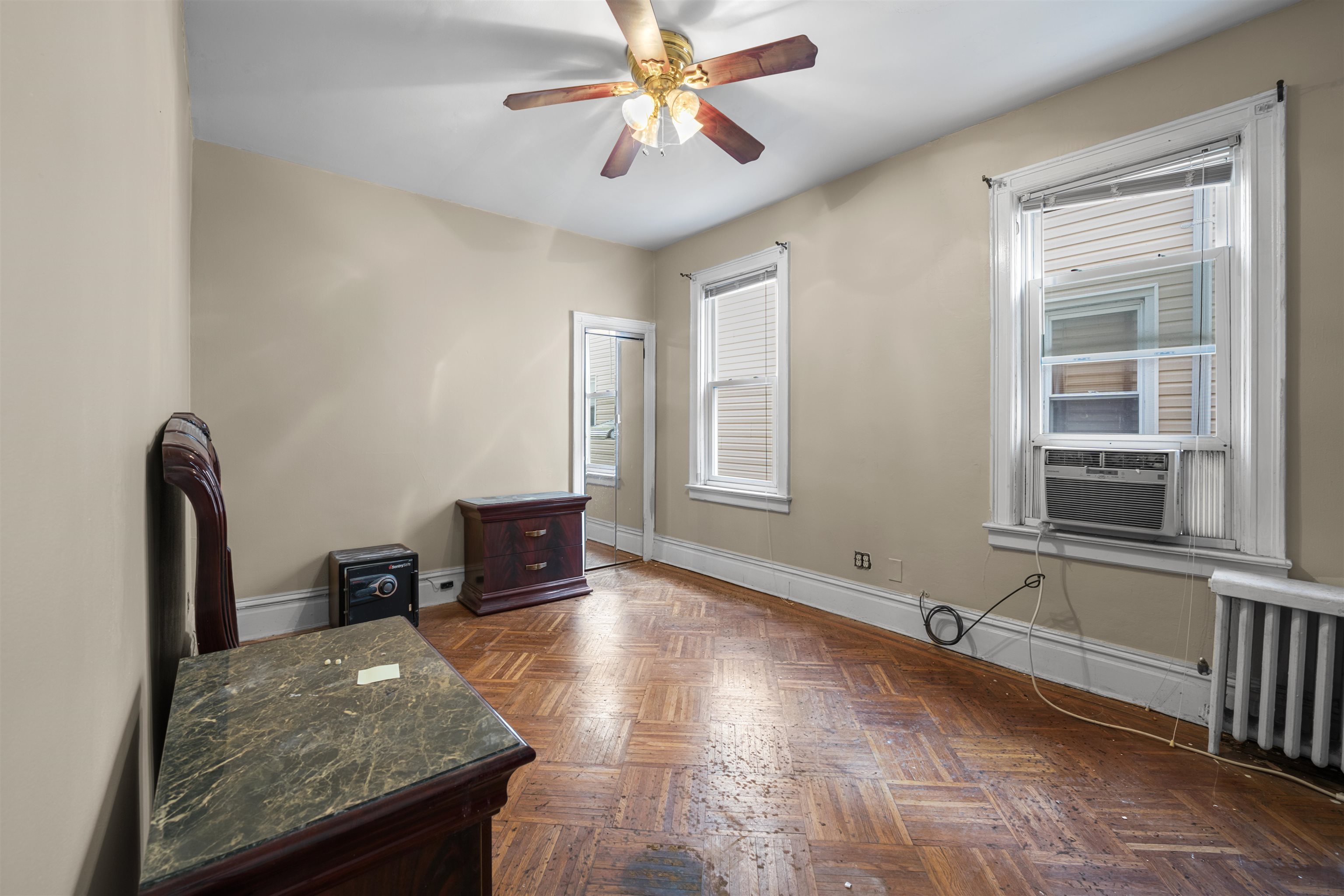 154 West 33rd Street Bayonne, NJ 07002 - Photo 26 of 40 a living room with furniture and a flat screen tv