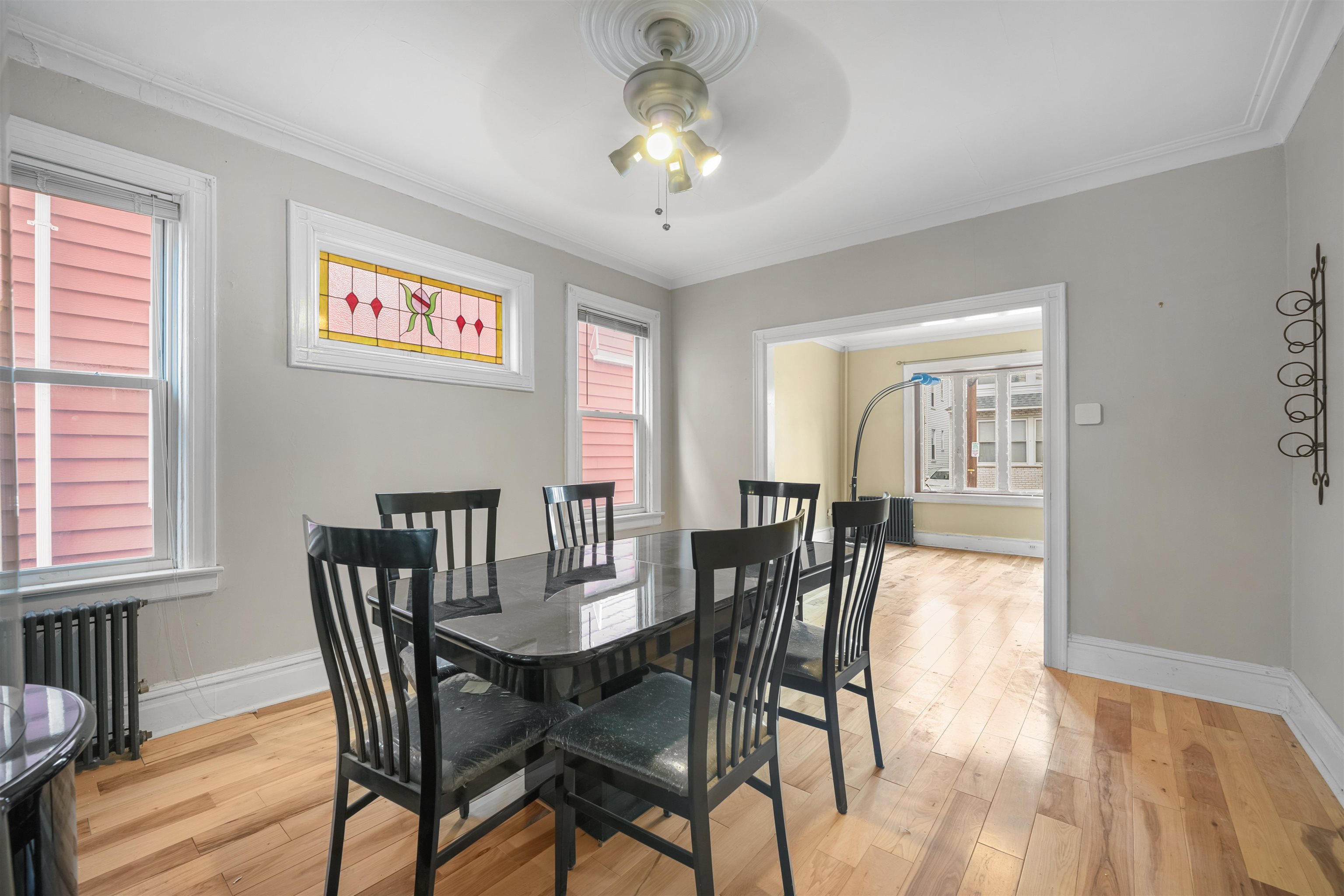 154 West 33rd Street Bayonne, NJ 07002 - Photo 39 of 40 a view of a dining room with furniture window and wooden floor
