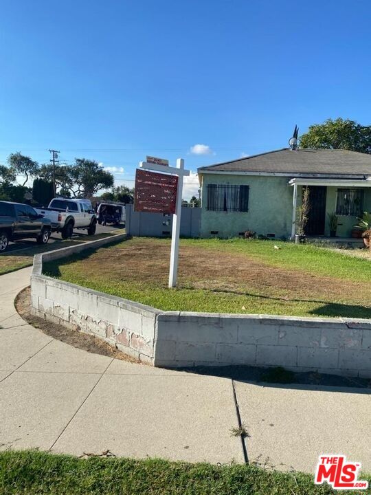 1400 West 130th Street Compton, CA 90222 - Photo 10 of 14 a view of a house with swimming pool