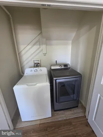 a utility room with washer and dryer