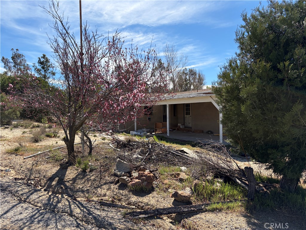 39175 Boulder Way Anza, CA 92539 - Photo 12 of 60 a view of a house with a yard