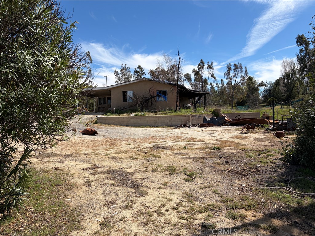 39175 Boulder Way Anza, CA 92539 - Photo 28 of 60 a view of a house with a yard covered in snow