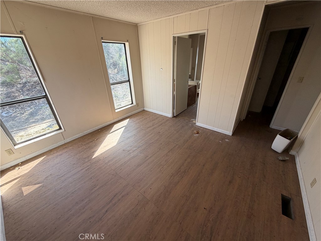 39175 Boulder Way Anza, CA 92539 - Photo 40 of 60 a view of an entryway with wooden floor