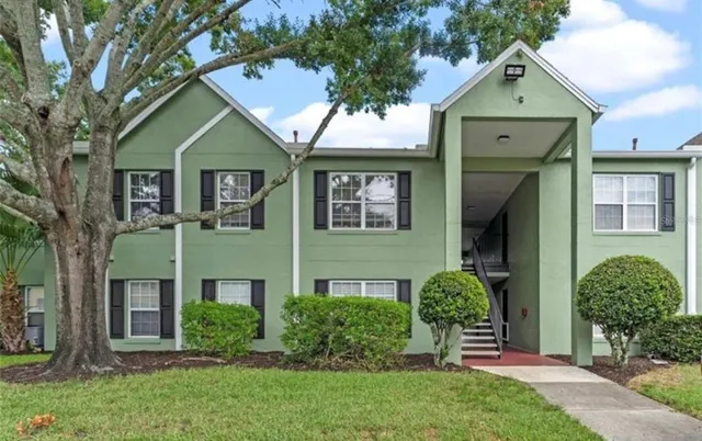front view of a house with a garden