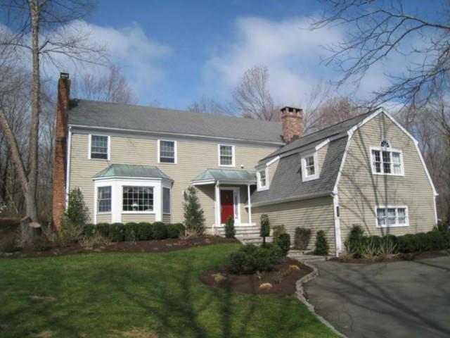 381 Sturges Ridge Road Wilton, CT 06897 - Photo 1 of 1 a front view of a house with a yard