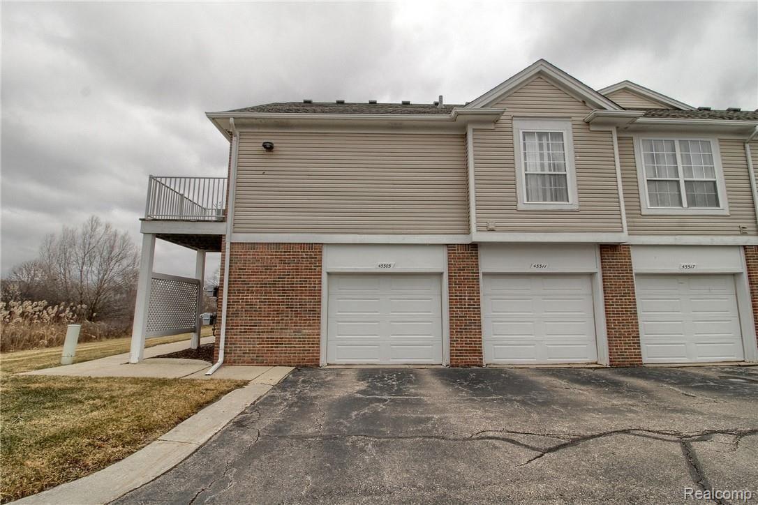 45505 Heather Ridge Drive, Unit 97 Macomb, MI 48044 - Photo 24 of 28 24-Rear And Garage.jpg