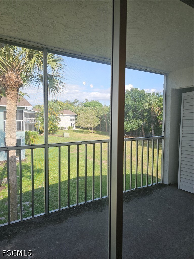8101 Country Road, Unit 201 Fort Myers, FL 33919 - Photo 17 of 34 a view of a large window with an outdoor space