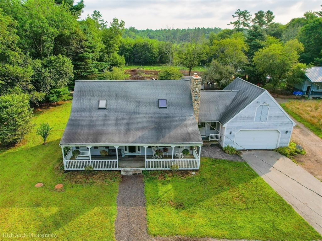 924 Walnut Plain Road Rochester, MA 02770 - Photo 33 of 36 an aerial view of a house with a yard
