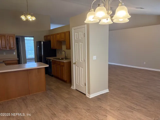 a view of a kitchen with a sink and dishwasher kitchen view