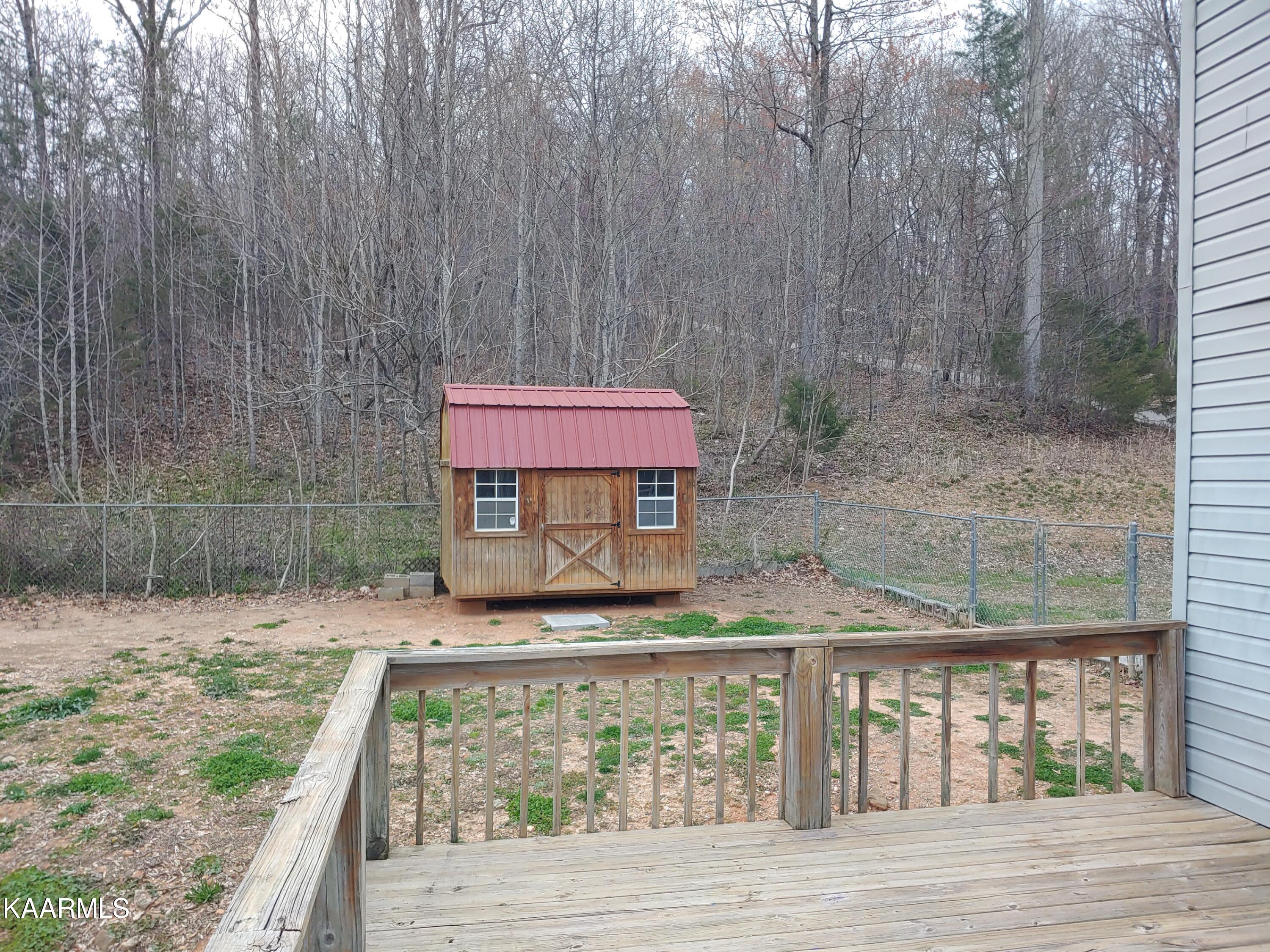131 Duke Lane Luttrell, TN 37779 - Photo 23 of 29 Deck and Shed