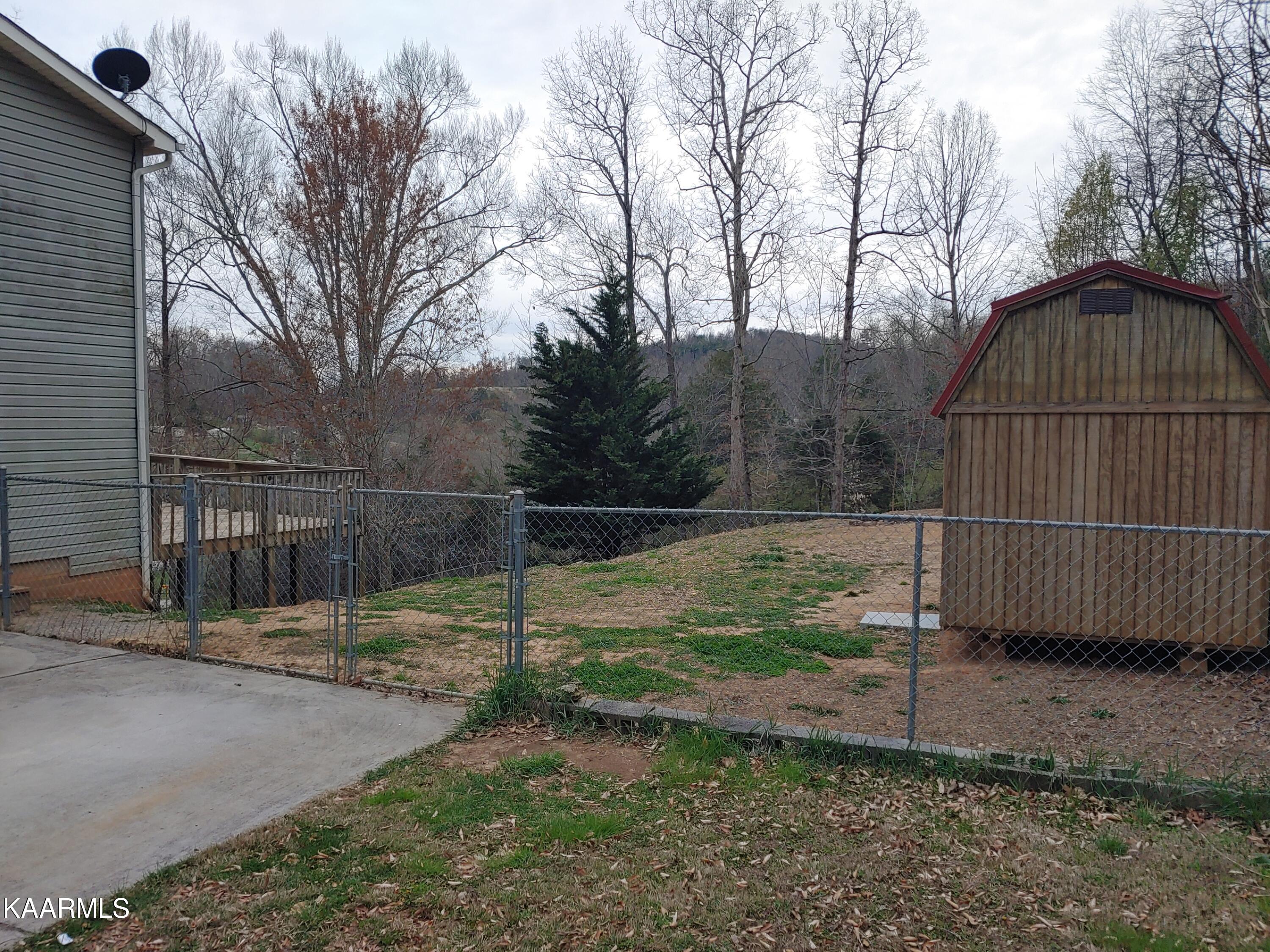 131 Duke Lane Luttrell, TN 37779 - Photo 24 of 29 Deck Shed driveway
