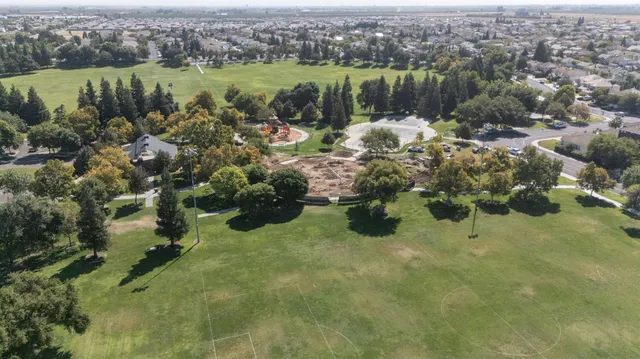 a view of lake with green space