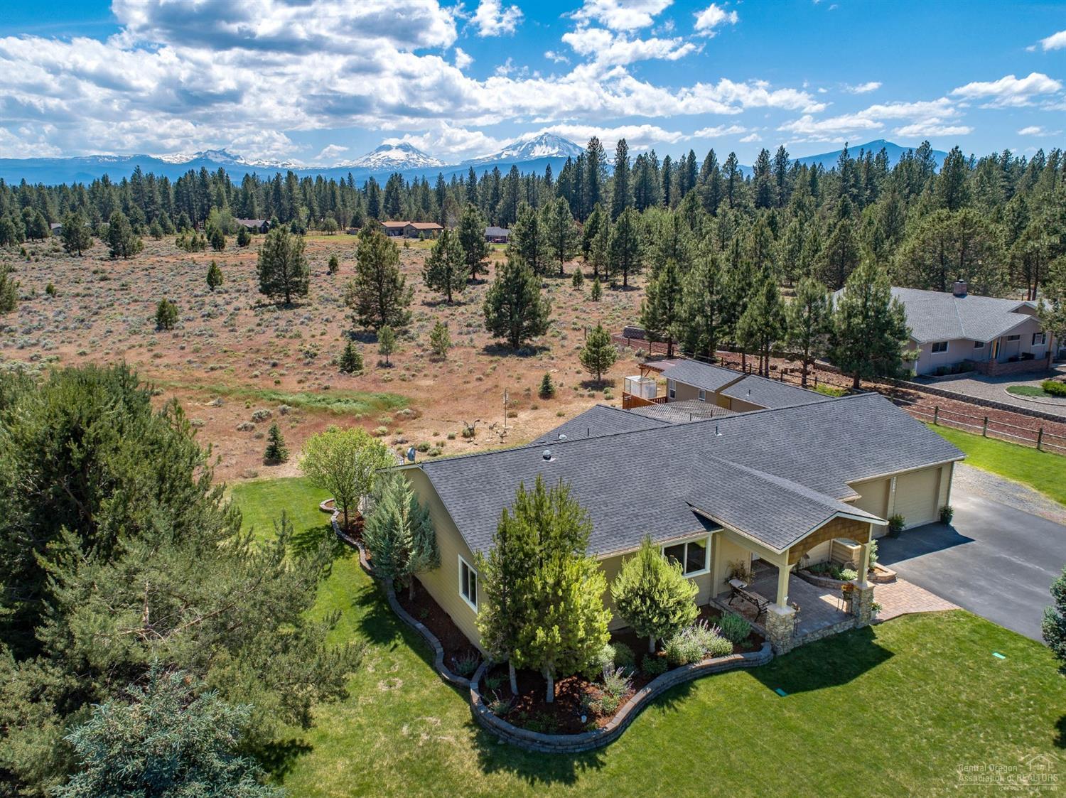 69770 Old Wagon Road Sisters, OR 97759 - Photo 2 of 23 The house sits at the edge of Sage Meado