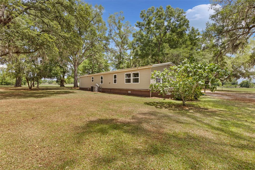 6689 Southeast 55th Street Trenton, FL 32693 - Photo 52 of 83 a view of an outdoor space and yard