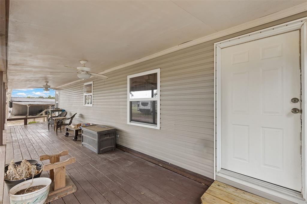 6689 Southeast 55th Street Trenton, FL 32693 - Photo 65 of 83 a living room with furniture and a window