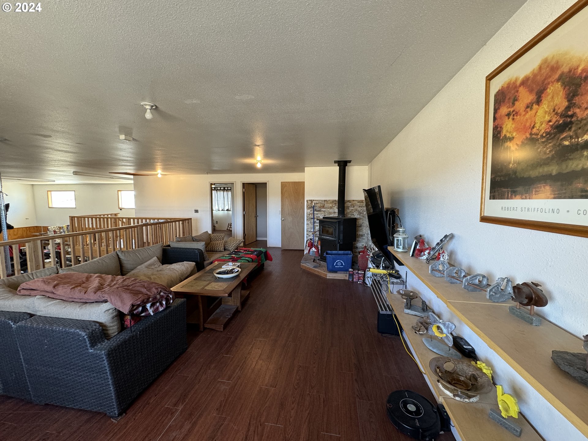 19 Newton Road Centerville, WA 98613 - Photo 31 of 48 a living room with furniture and a flat screen tv