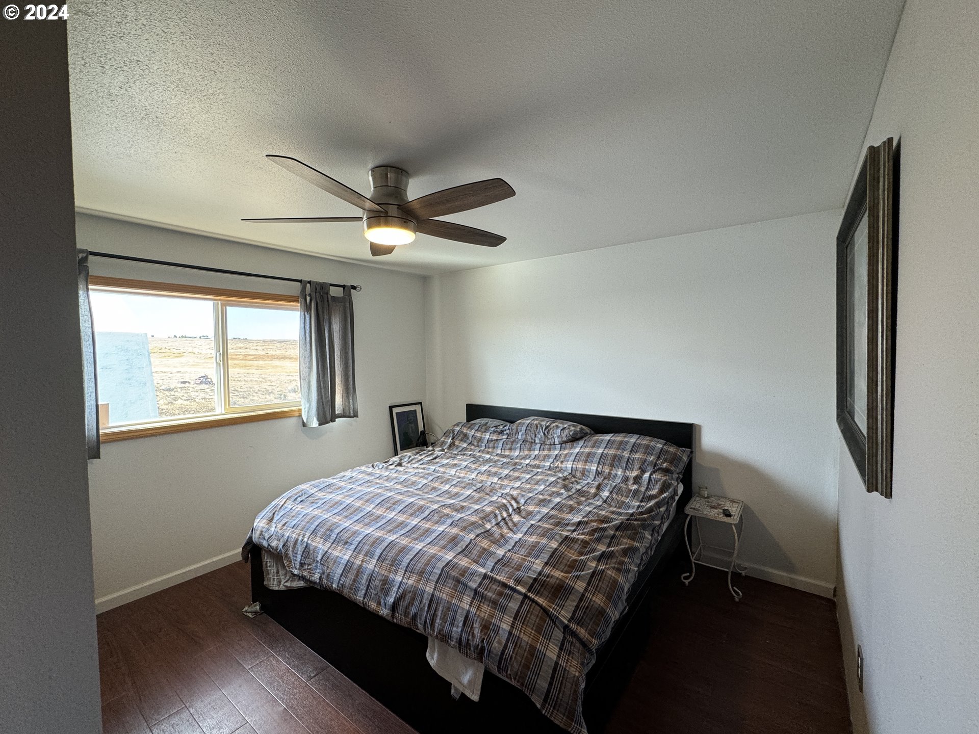 19 Newton Road Centerville, WA 98613 - Photo 35 of 48 a bedroom with a bed and a window