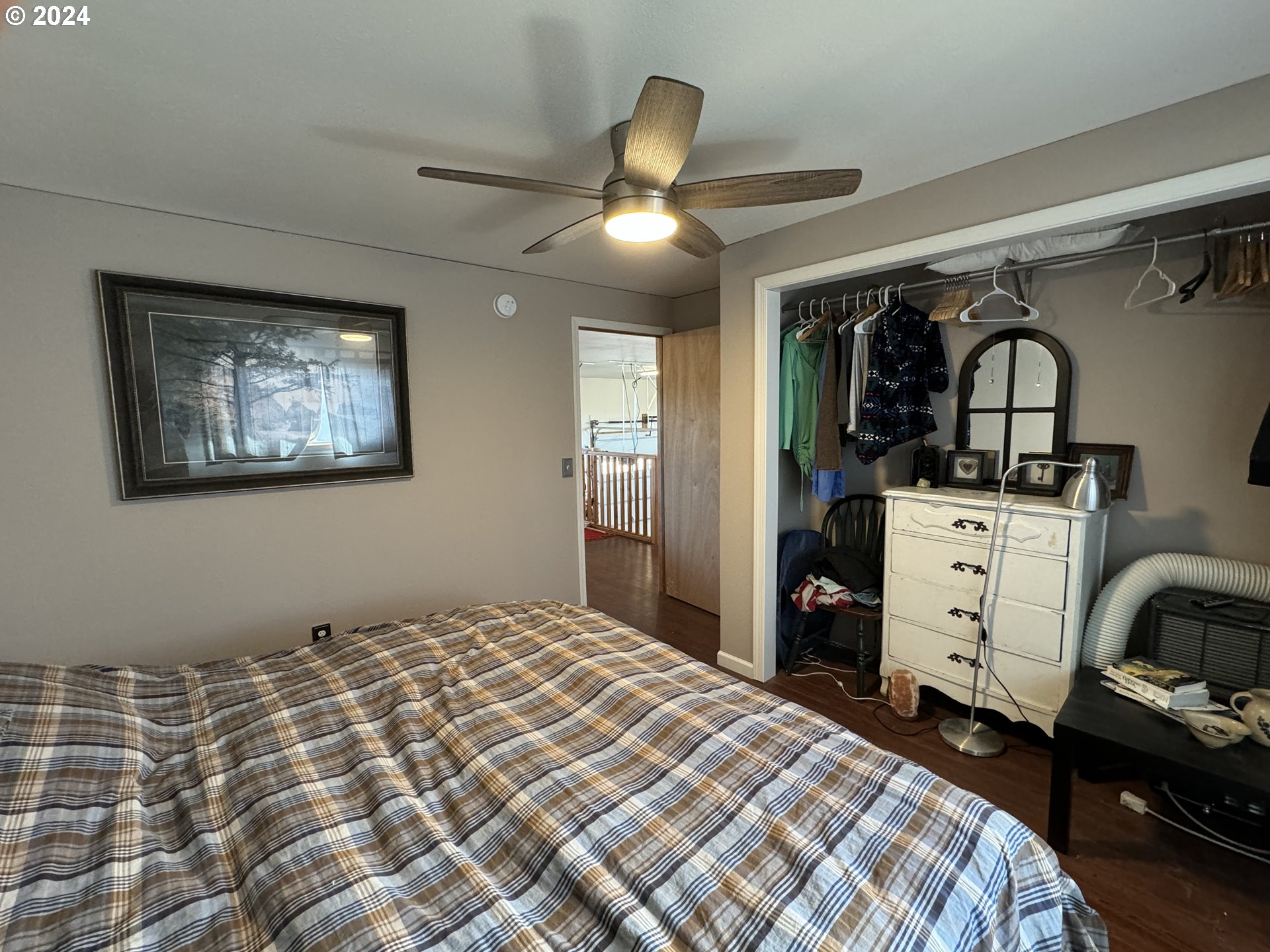 19 Newton Road Centerville, WA 98613 - Photo 36 of 48 a bedroom with a bed and a cabinets