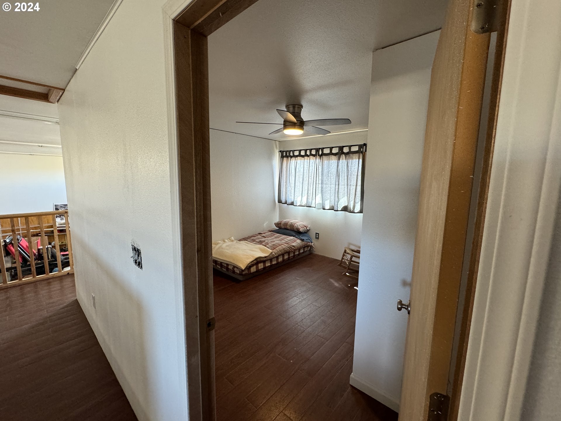 19 Newton Road Centerville, WA 98613 - Photo 37 of 48 a view of a hallway to a livingroom and a livingroom with furniture