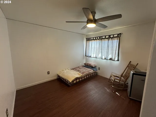 a view of a lake with houses in the back