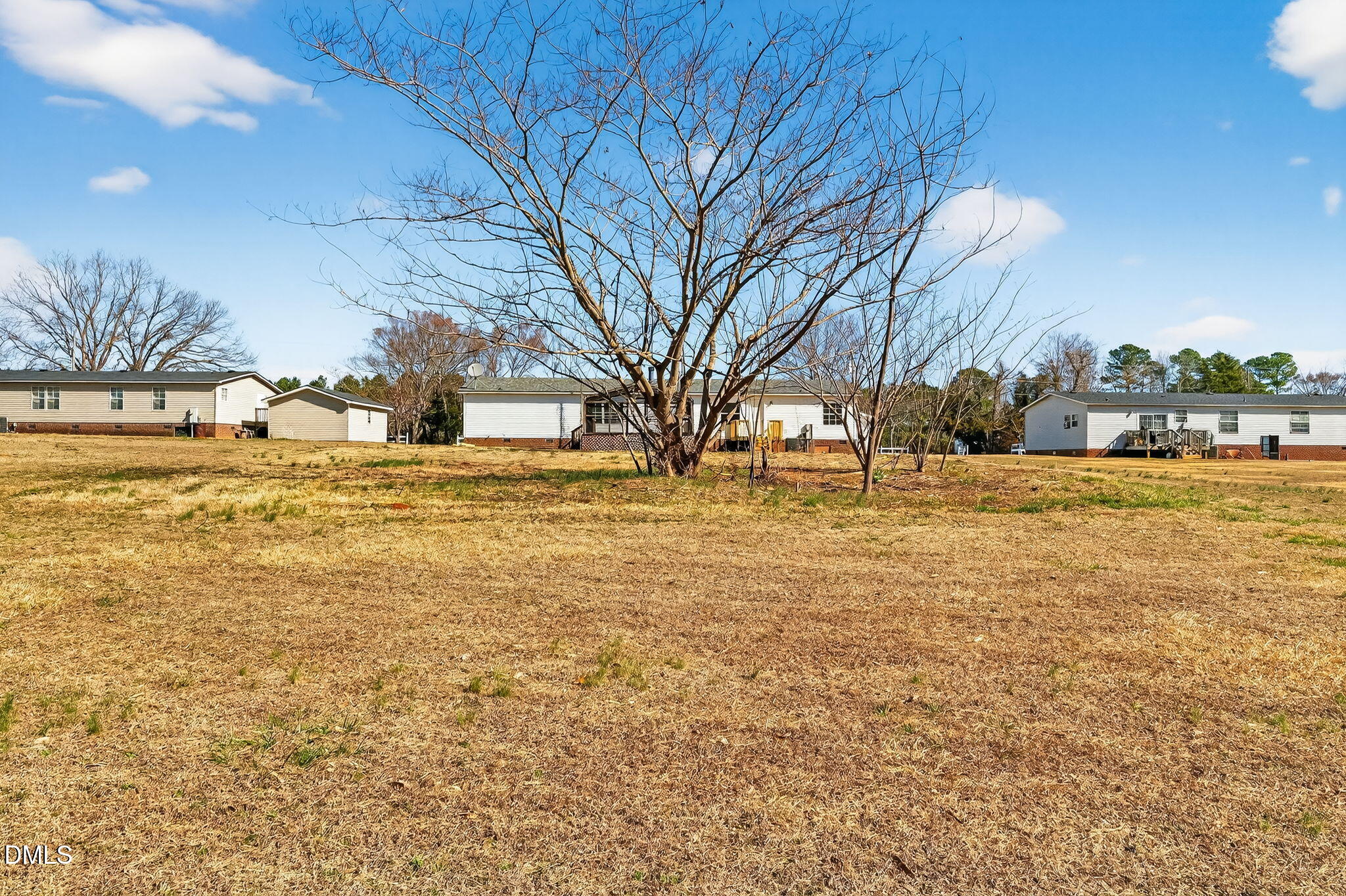 10015 Smith Road Middlesex, NC 27557 - Photo 45 of 48 a view of yard with swimming pool and trees