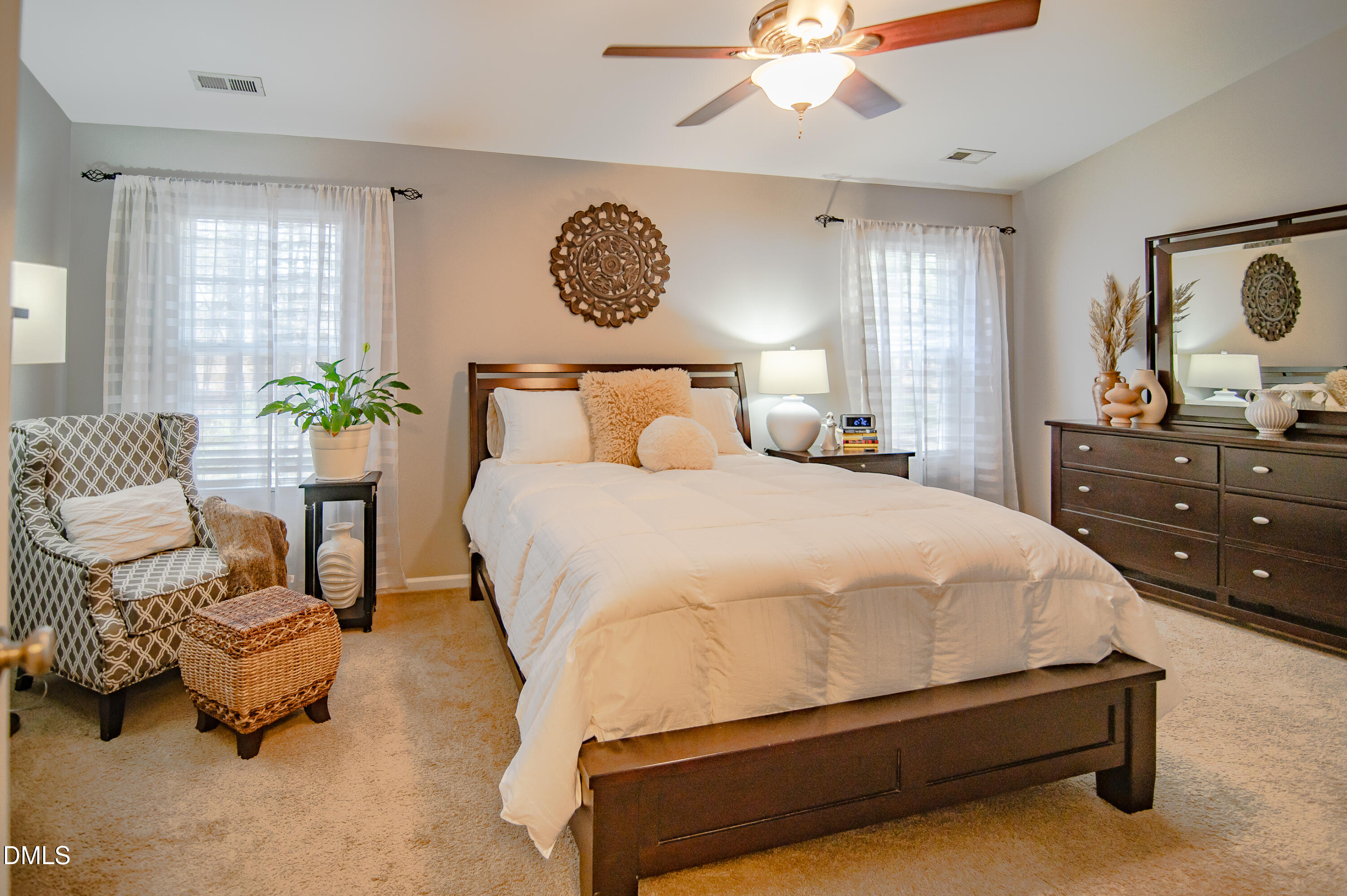 2933 Winding Waters Way Raleigh, NC 27614 - Photo 17 of 24 a bedroom with a bed and window