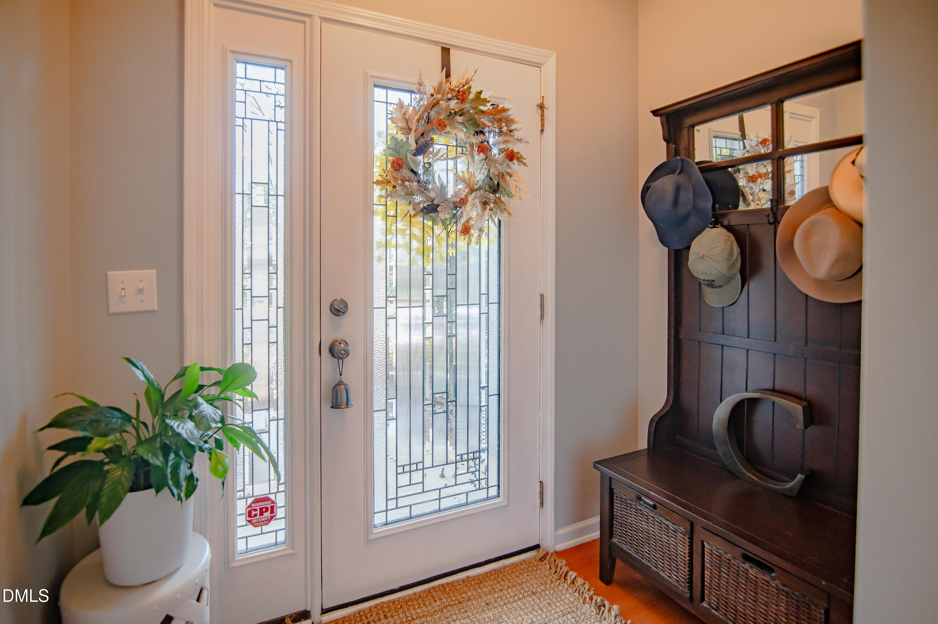 2933 Winding Waters Way Raleigh, NC 27614 - Photo 3 of 24 a vase of flowers sitting on a table