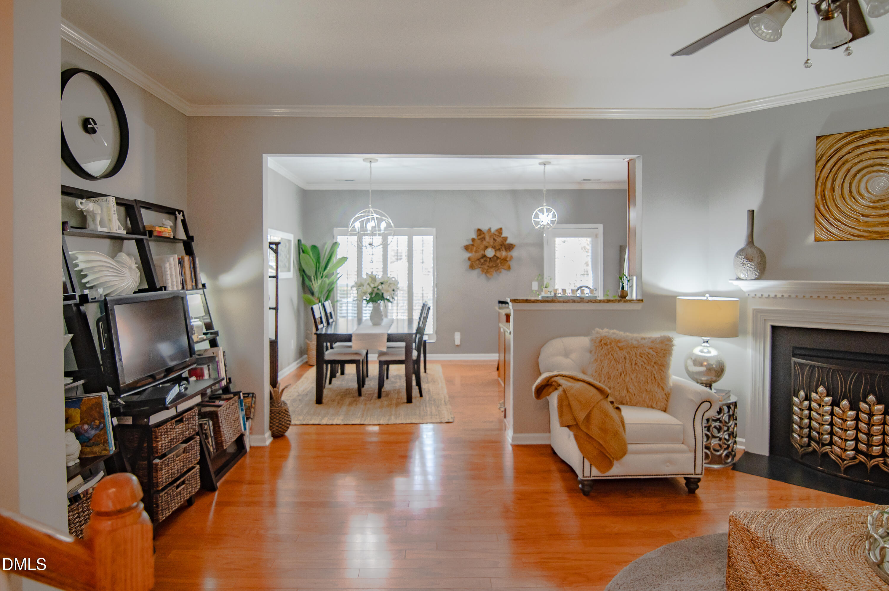 2933 Winding Waters Way Raleigh, NC 27614 - Photo 5 of 24 a living room with furniture and a fireplace