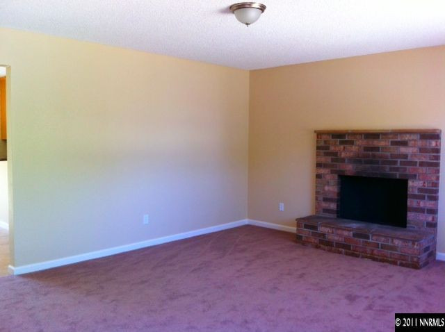 1455 Locksley Way Reno, NV 89503 - Photo 3 of 5 a room with a fireplace