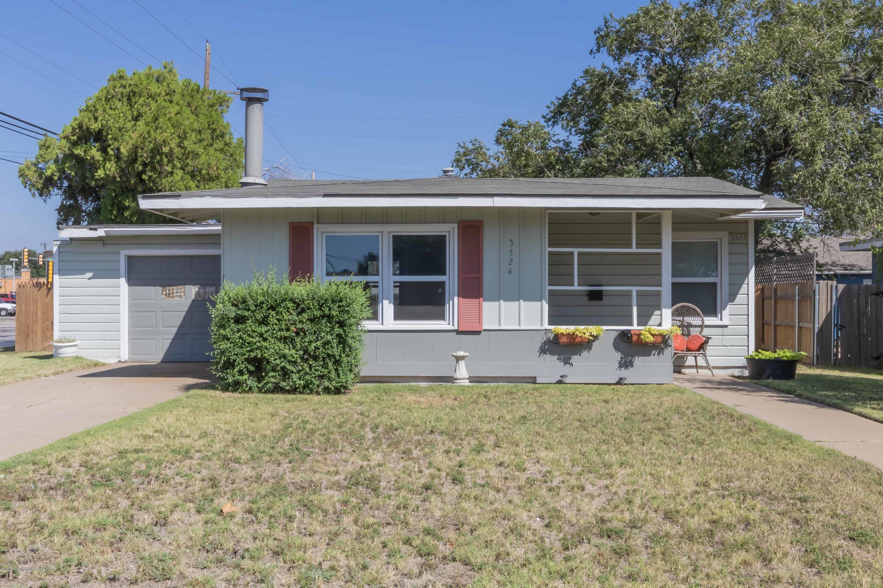 front view of a house with a patio