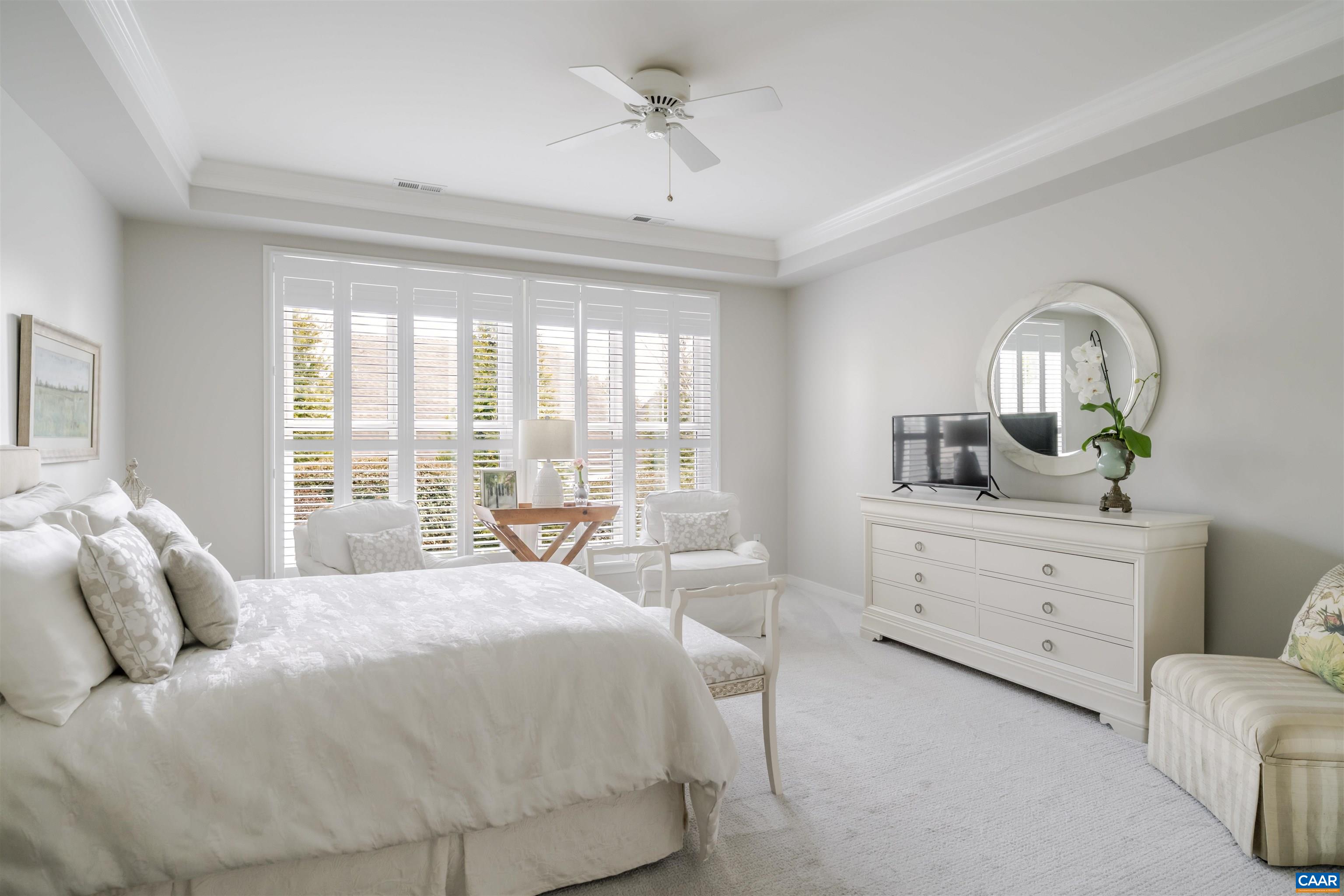 1322 Stonegate Court Crozet, VA 22932 - Photo 19 of 39 a bedroom with a bed a large window and mirror